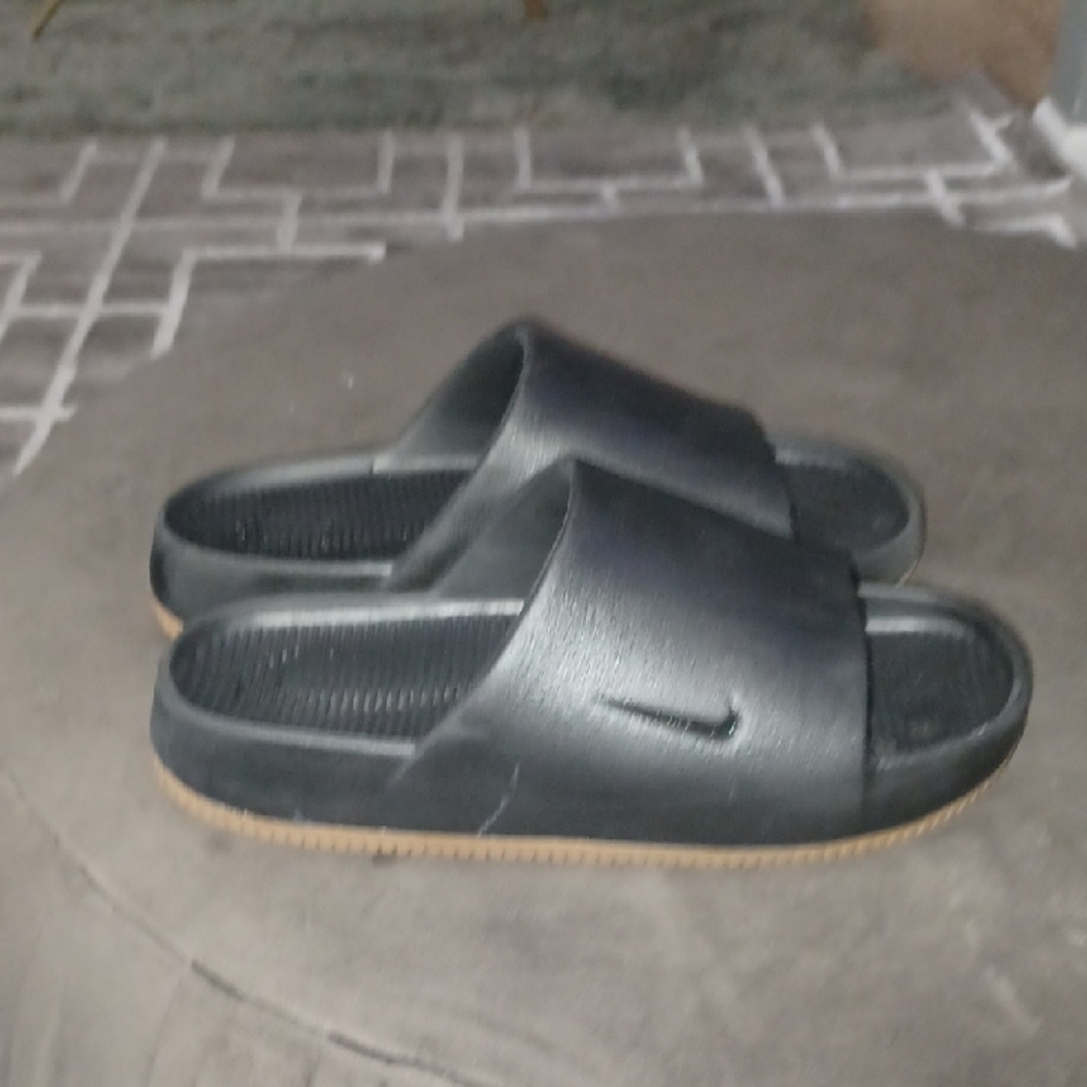 Black Slide Sandals with Tan Soles. "Nike" M/10 W/11 size.